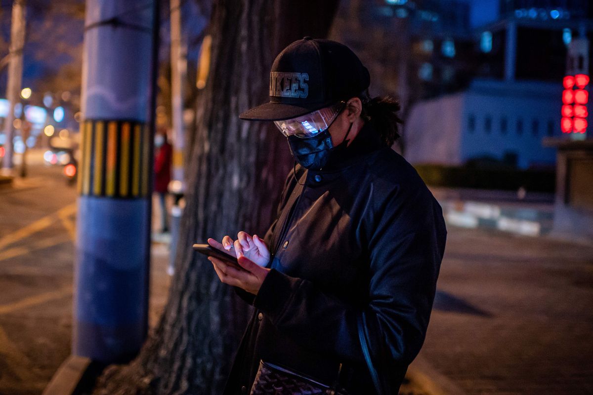 A person checking his phone