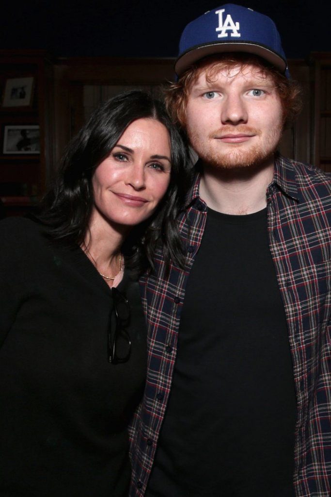 Courtney Cox and Ed Sheeran posing for a picture