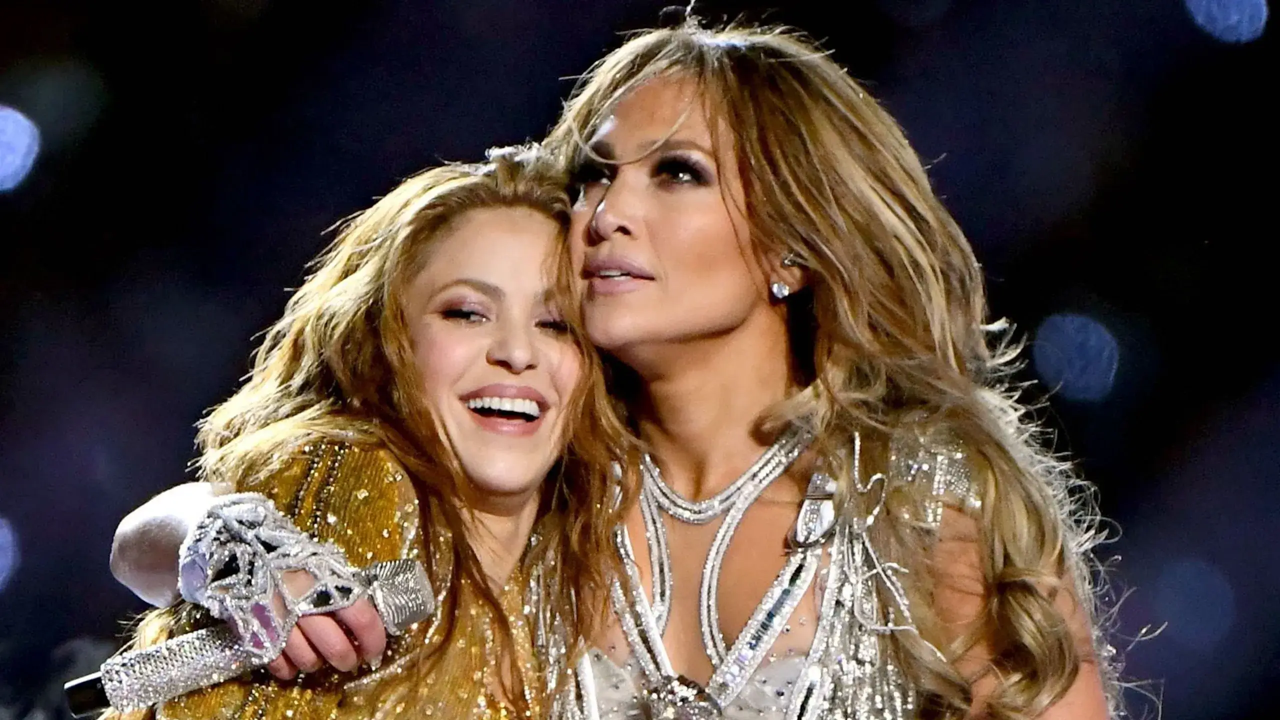 Jennifer Lopez and Shakira hug at the Super Bowl 2020