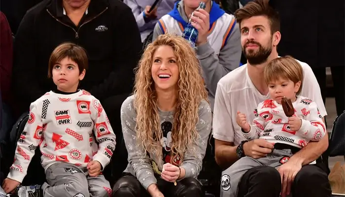 Gerard Pique and Shakira with their children