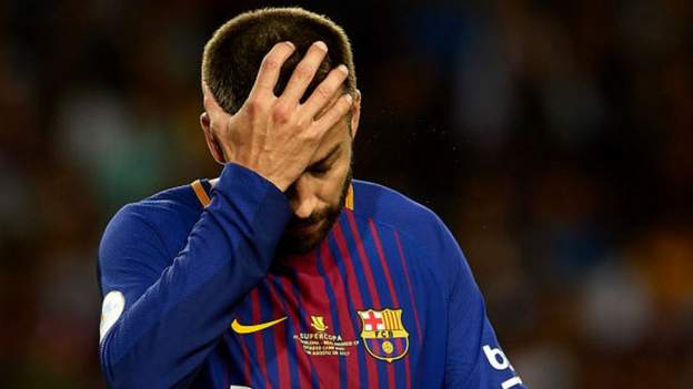 Gerrard Pique in his Barcelona jersey, cries after a match.