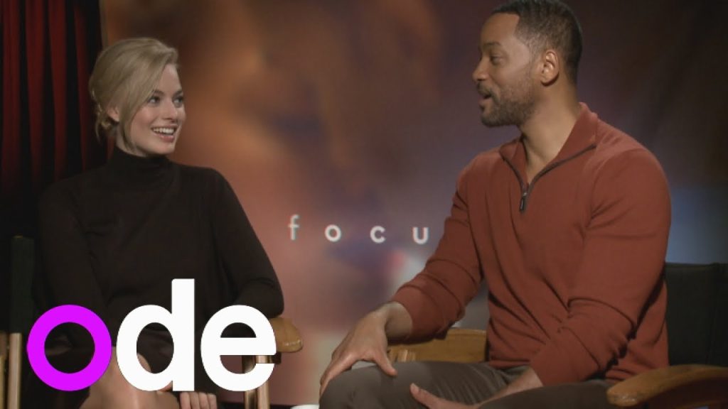 Margot Robbie and Will Smith in an interview for their film - Focus