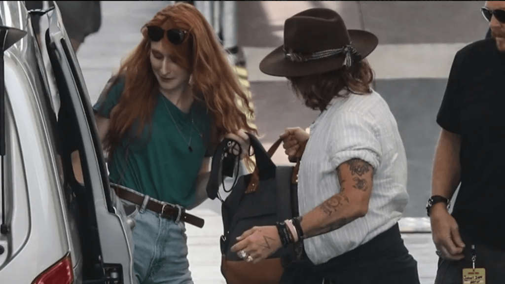 Johnny Depp Spotted With a Redhead Woman