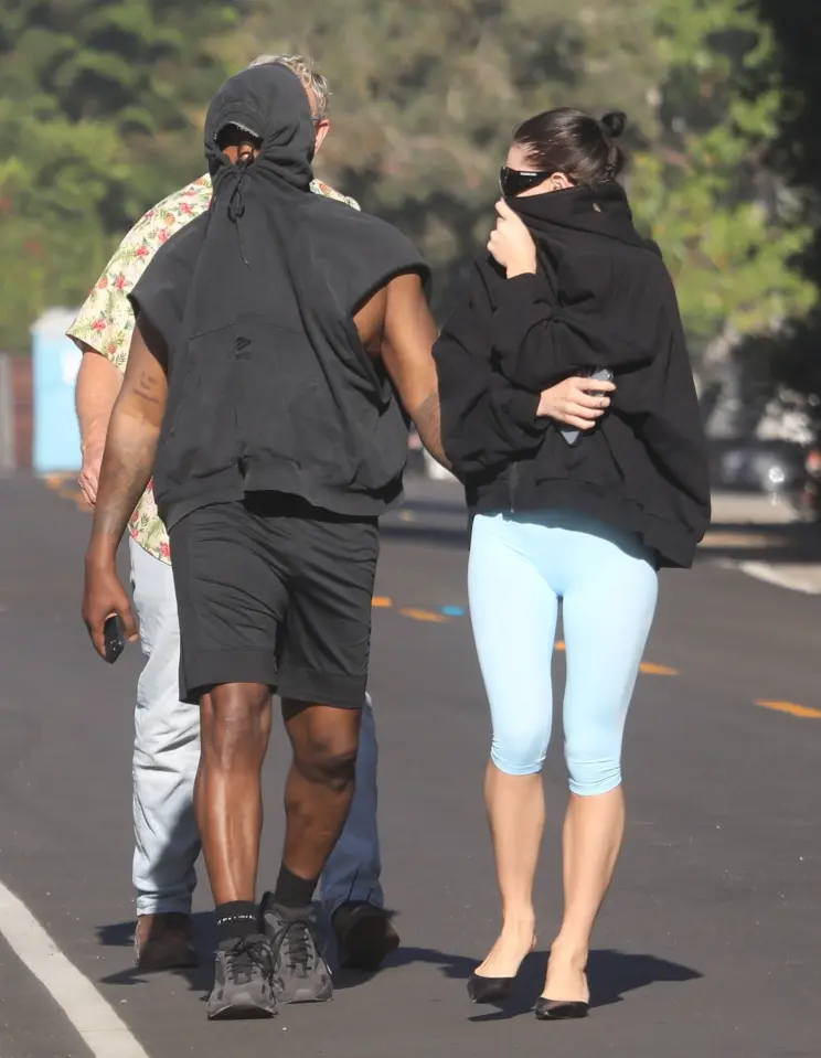 Kanye West spotted with a Mystery Brunette.