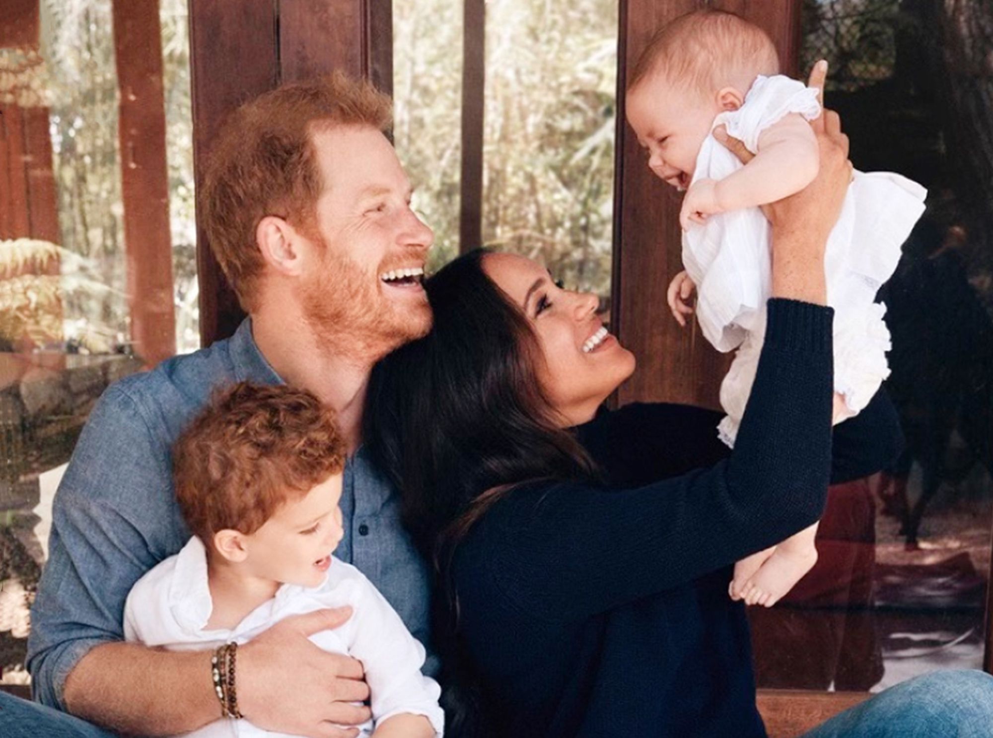 Prince Harry and Meghan Markel with their family 