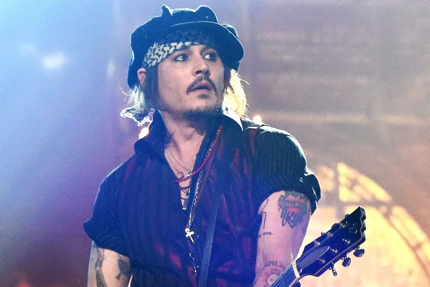 Johnny Depp spotted waving at fans after Rock tour