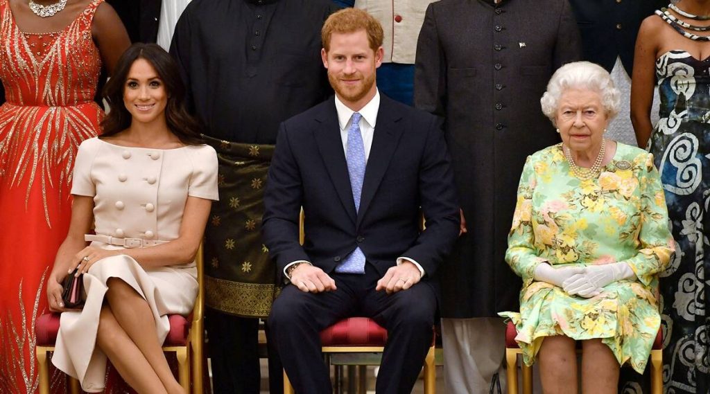 Prince Harry with Queen Elizabeth II and Meghan Markle